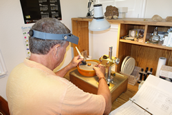 Dr Jim polishing gemstone